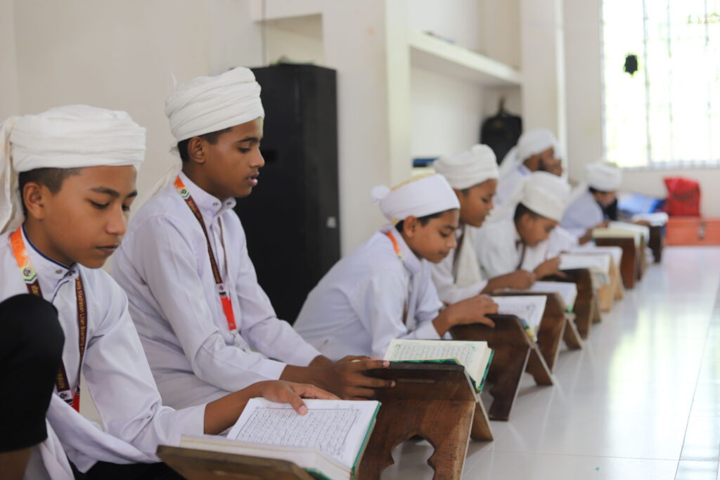 students learning the holy Quran